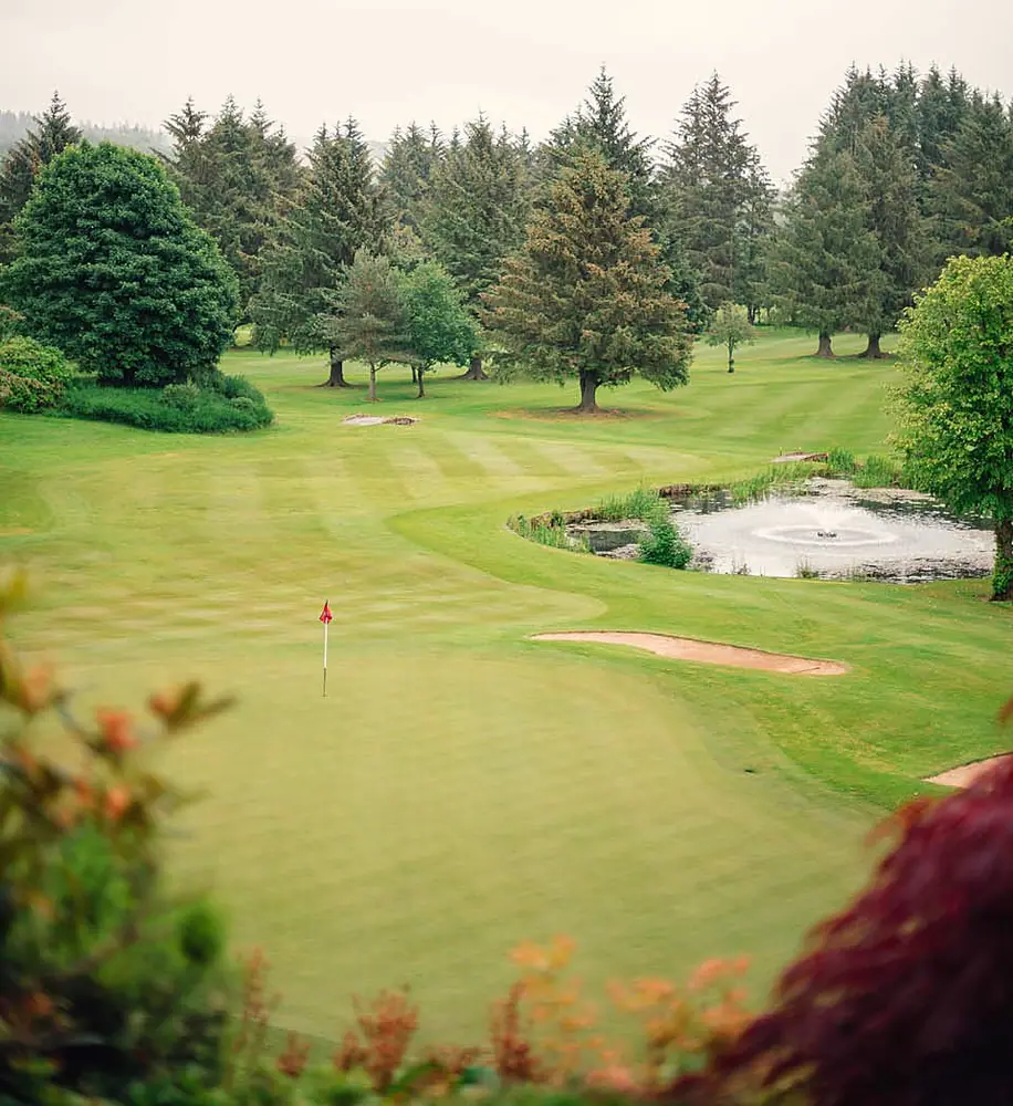 The 18th hole of the Haughton Course with the clubhouse beyond
