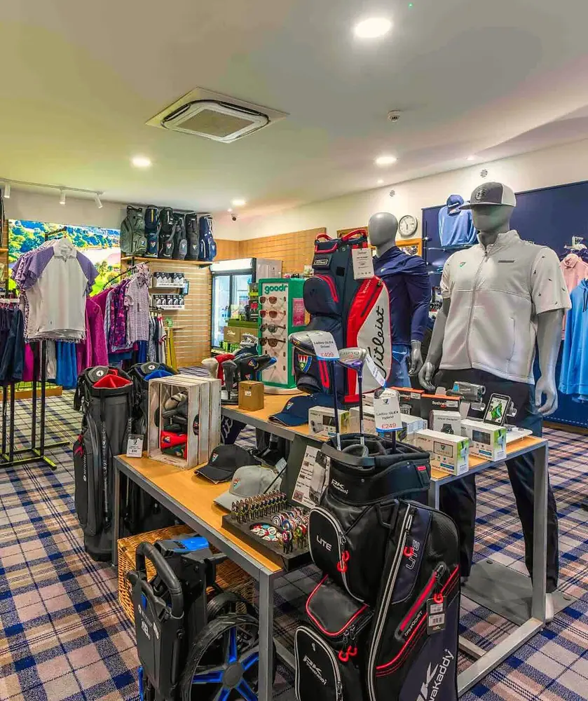 Inside the Pro Shop with golf bags, clothing, clubs and accessories
