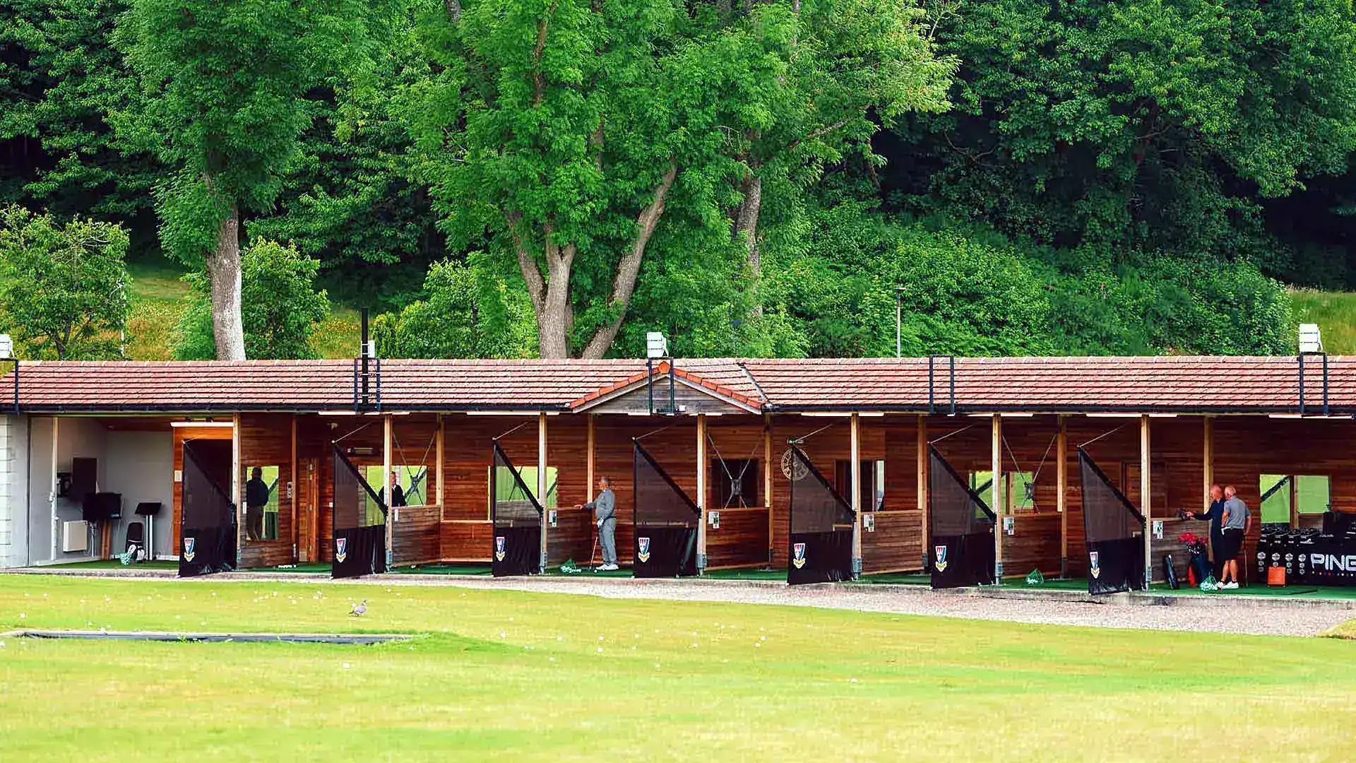 The floodlit TrackMan driving range at Deeside Golf Club